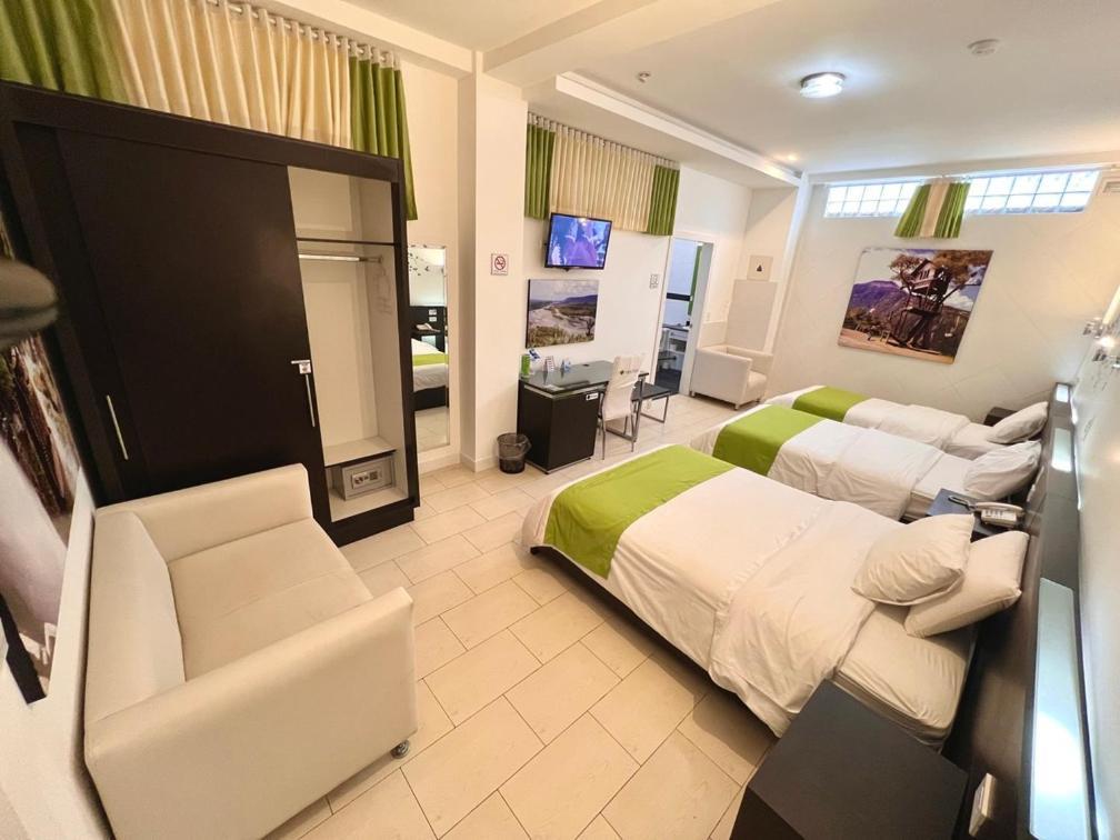 Destiny Hotel บาญอส ภายนอก รูปภาพ